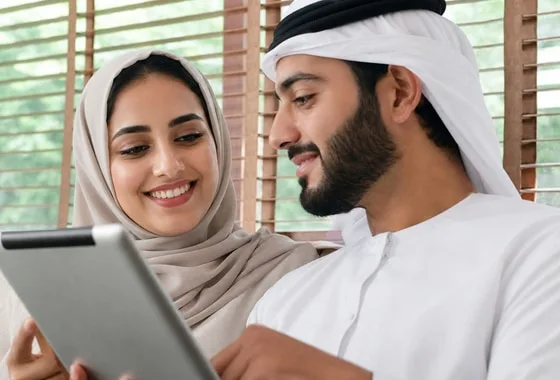 UAE employee reviewing healthcare support on a tablet